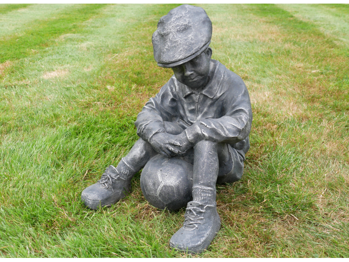 Boy Sat With Football