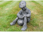 Boy Sat With Football