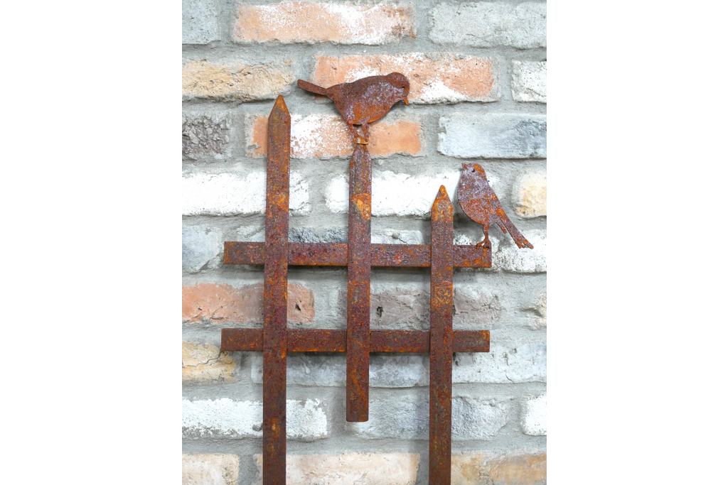 Rusty Fence With Birds Stake