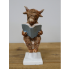 Highland Cow On The Loo