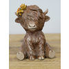Sitting Highland Cow