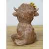Sitting Highland Cow