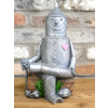 Tin Man Sat On A Log