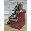Highland Cow In A Chair