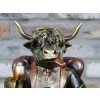 Highland Cow In A Chair