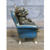 Highland Cow On A Chair