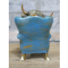 Highland Cow On A Chair