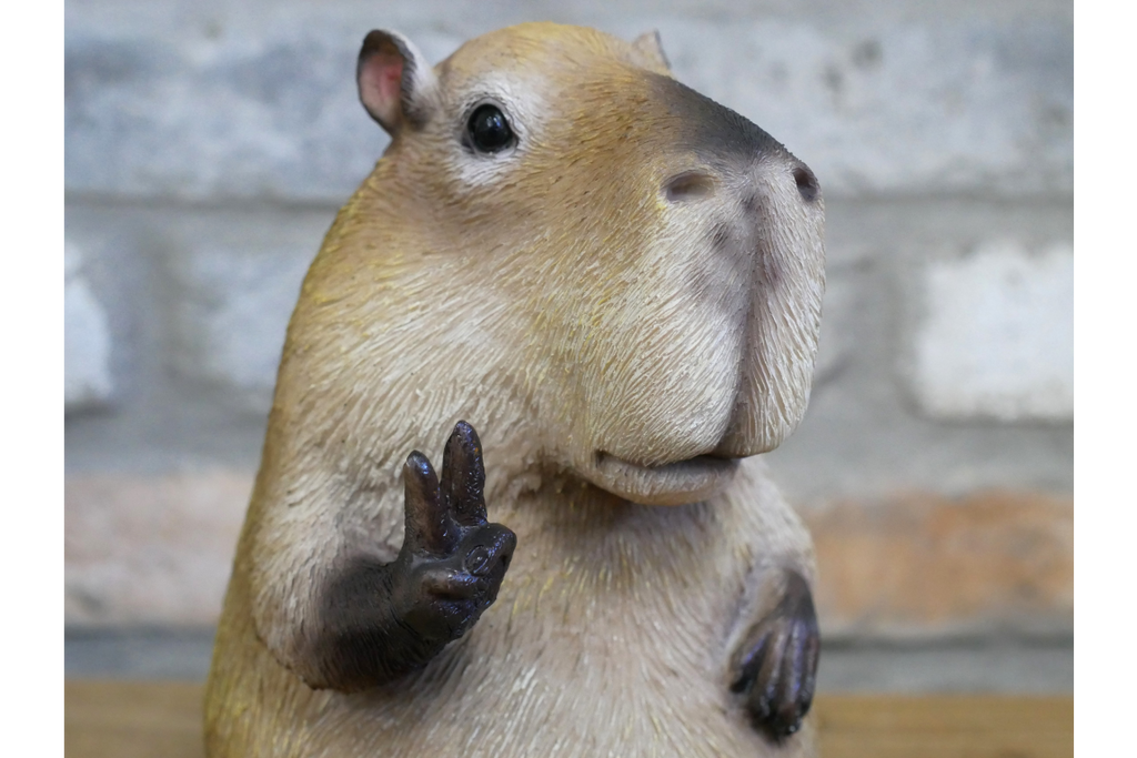 Quirky Resin Capybara Peace Sign Figurine - Cute Animal Home Table Decor