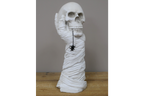 Hand Holding Skull