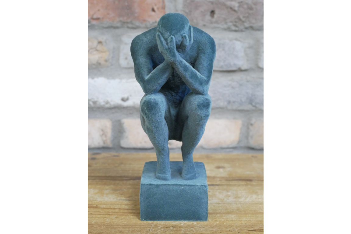 Man With Head In Hands