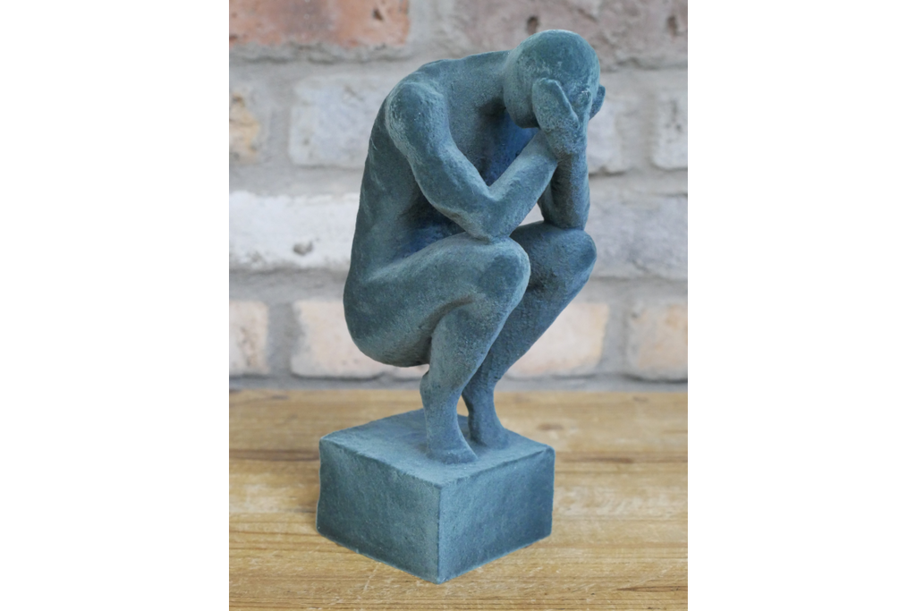 Man With Head In Hands