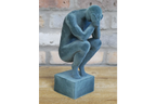 Man With Head In Hands