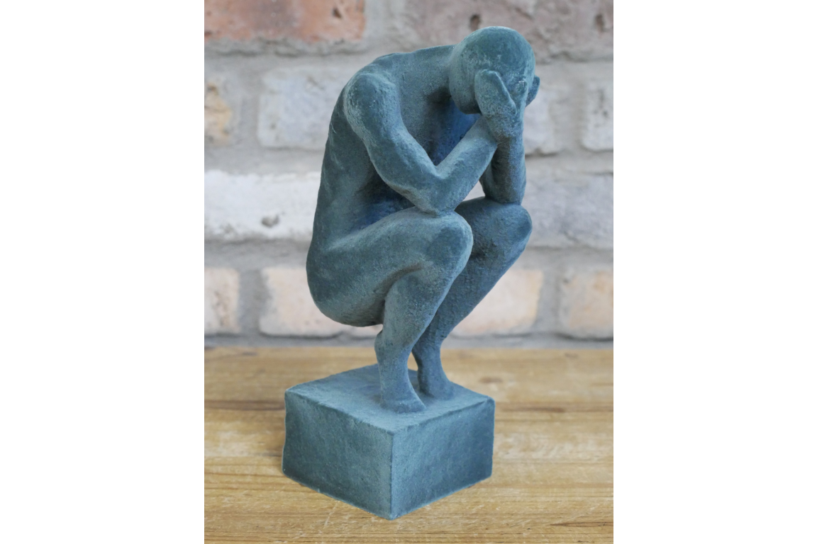 Man With Head In Hands