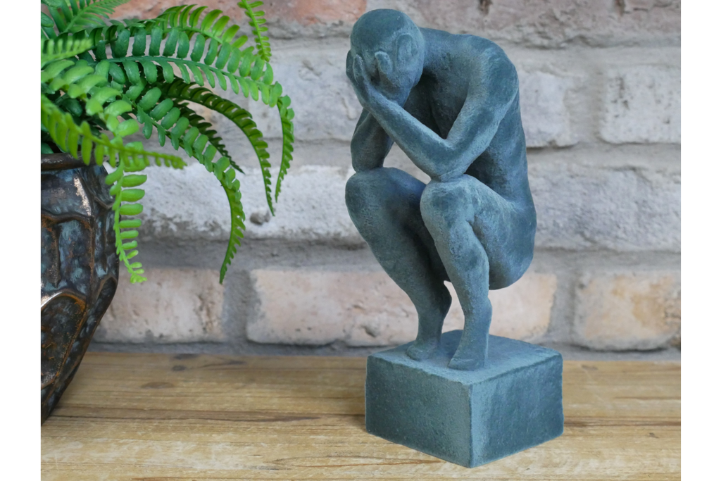 Man With Head In Hands