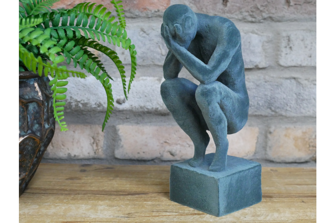 Man With Head In Hands