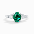 Emerald Oval Cut Three Stone Engagement Ring in Sterling Silver