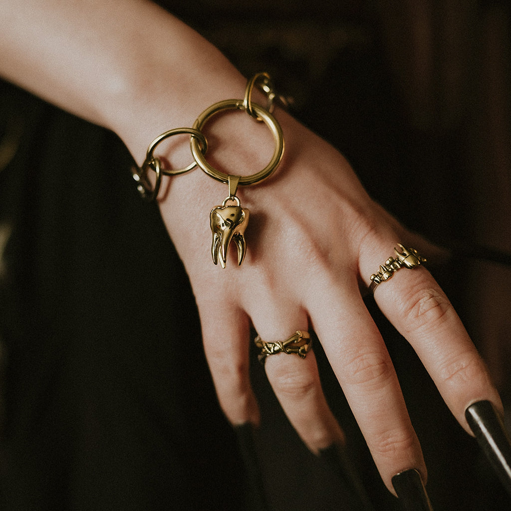 Gold The Tethered Remains Bone Ring
